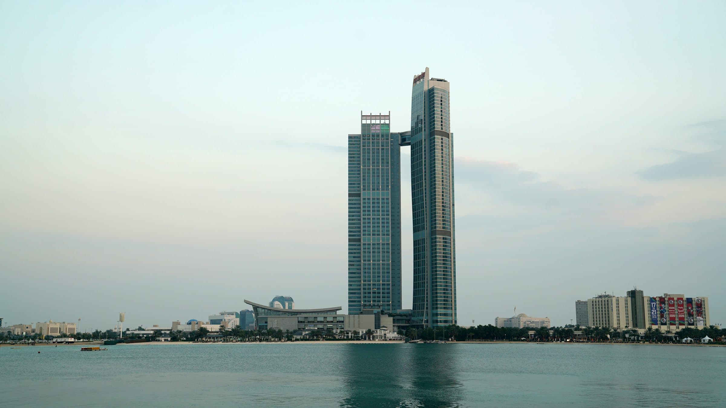 Nation Towers on the Abu Dhabi Corniche, seen across the water.
